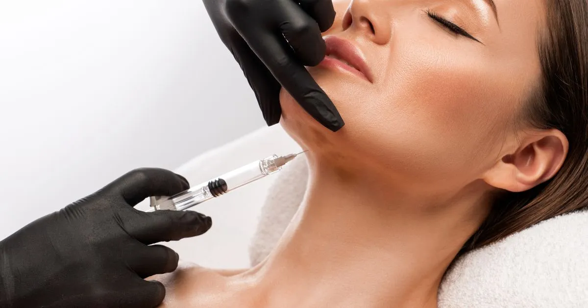 Patient receiving Kybella treatment for double chin reduction in East Brunswick, NJ